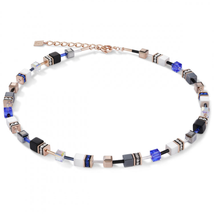 Collier Coeur de lion cubes blancs, noirs, bleus et acier rose