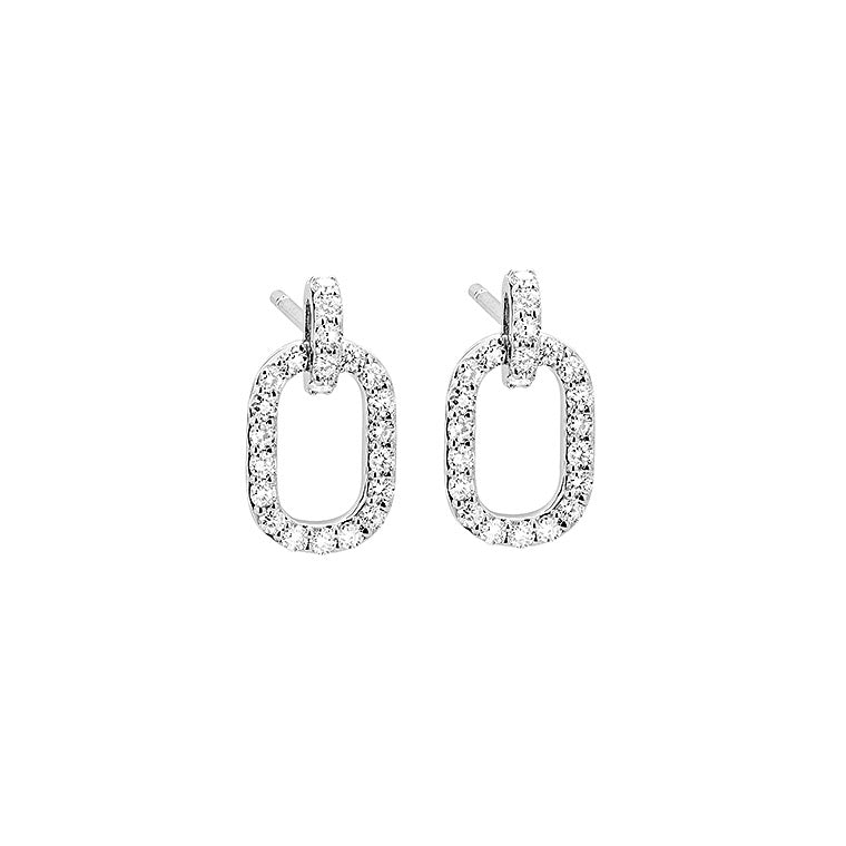 Boucles d'oreilles en or gris 18carats pendantes ovales sertis de diamants pour un caratage de 0.75carats. Ces boucles d'oreilles habilleront votre visage en toute discrétion et raffinement.