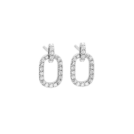 Boucles d'oreilles en or gris 18carats pendantes ovales sertis de diamants pour un caratage de 0.75carats. Ces boucles d'oreilles habilleront votre visage en toute discrétion et raffinement.