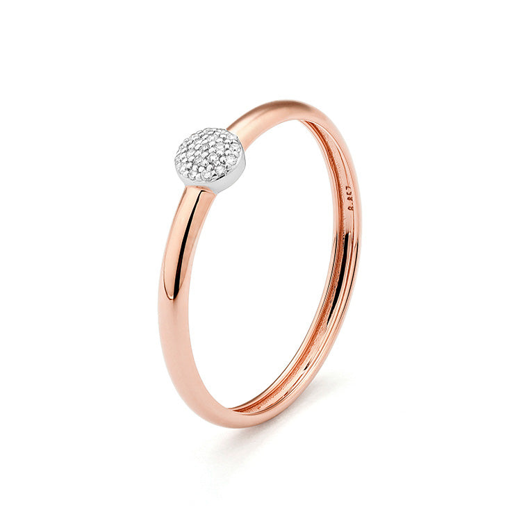 Bague bicolore en or blanc et rose avec un joli pavage de 19 diamants.