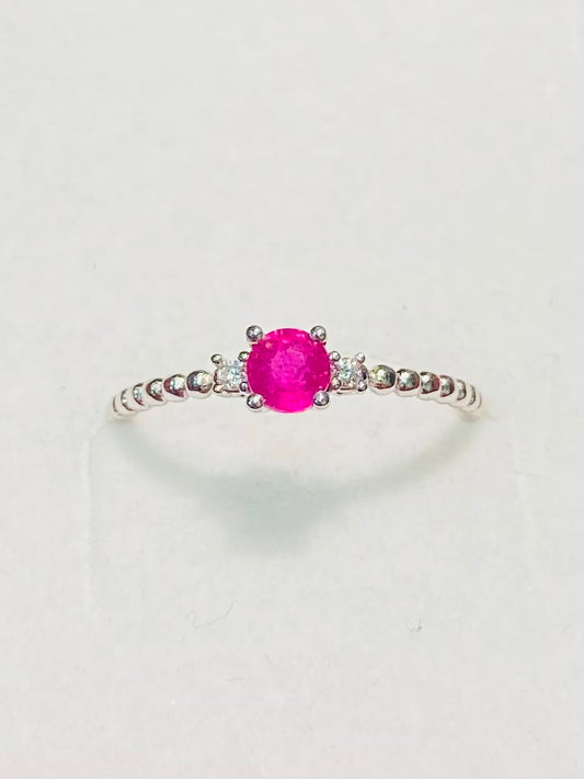 Bague en or jaune sertie d'un saphir rose et de diamants