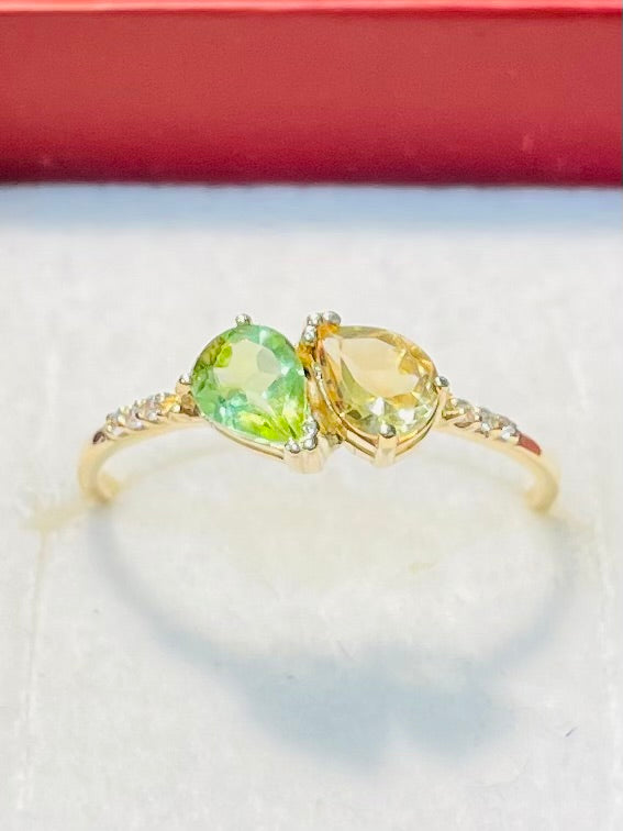 Bague en or jaune 18 carats sertie d'un péridot et d'une citrine